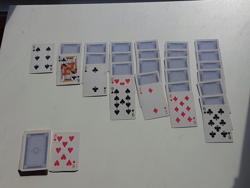 8 of Diamonds (or 8 of Hearts) can be played on the 9 of Spades